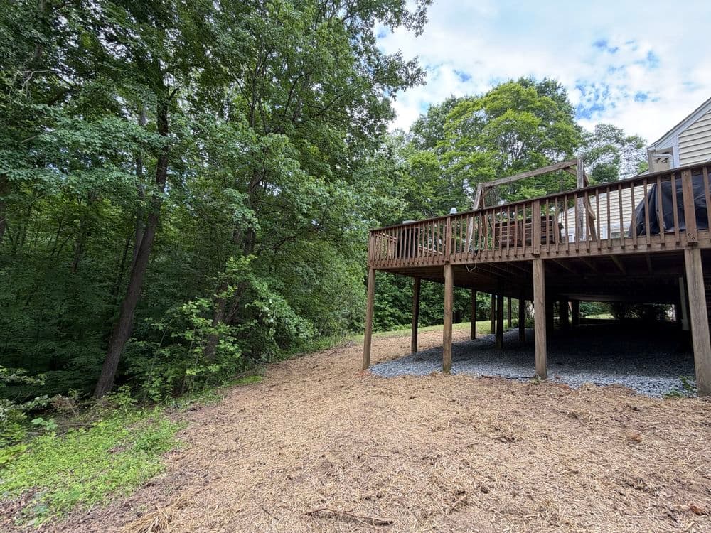 Gallery photos for Roof Drain Gutter Lead and Erosion Fix on a Hillside Home in Mechanicsville: Image #3