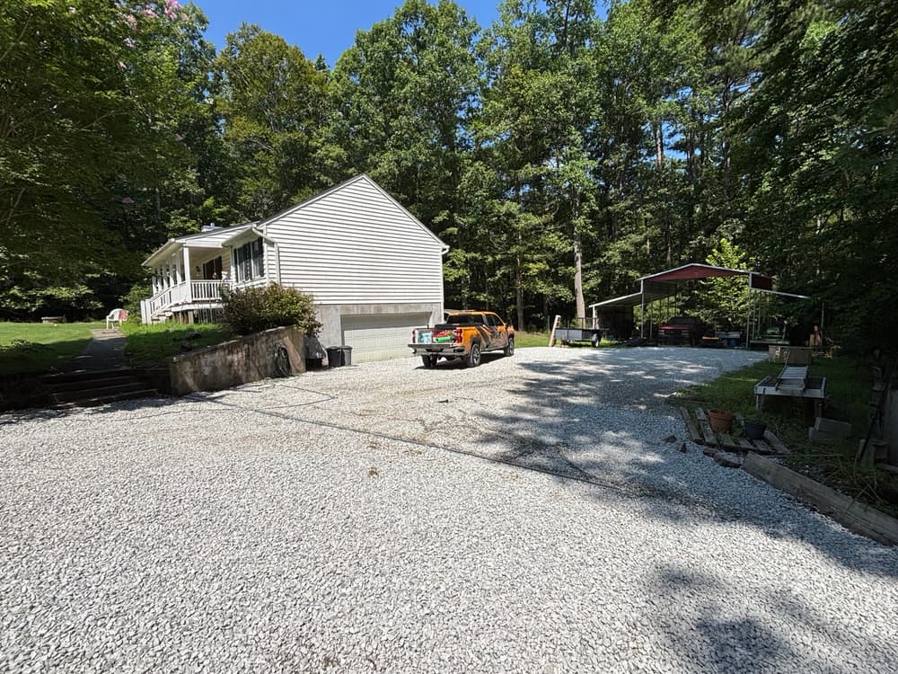 Gallery photos for Driveway Drainage Fix with Swale, Check Dams and New Gravel in West Point: Image #3