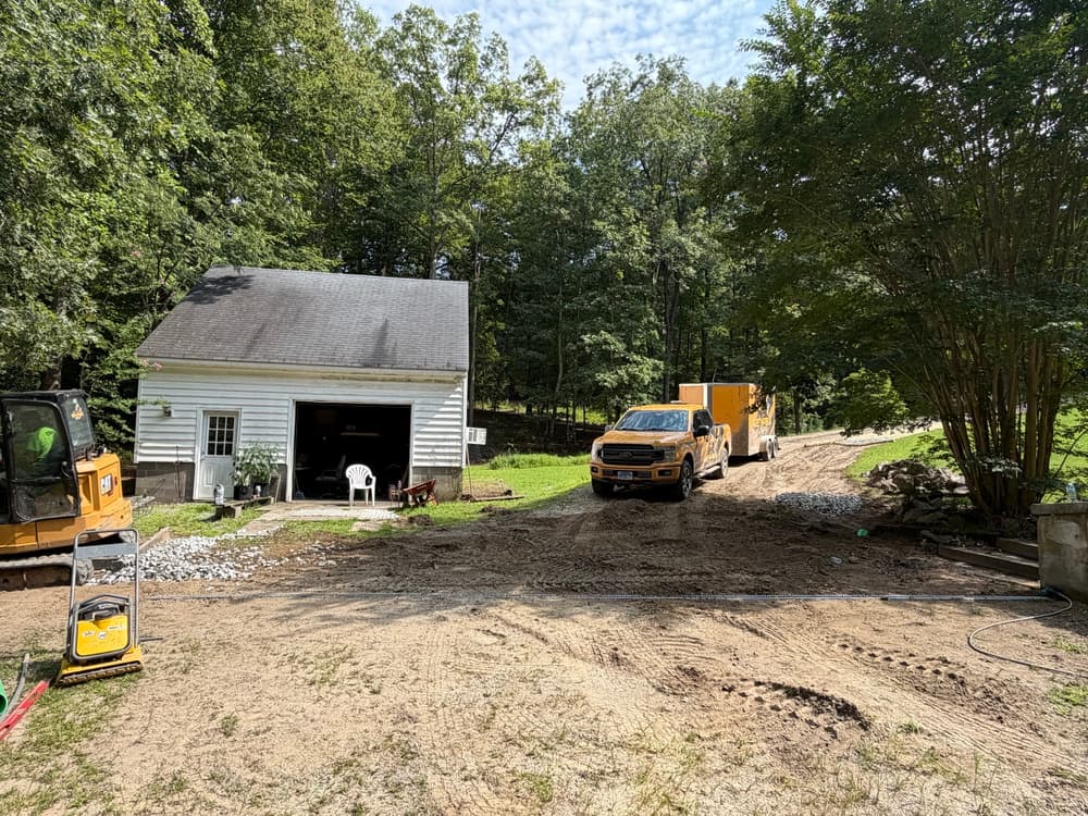 Gallery photos for Driveway Drainage Fix with Swale, Check Dams and New Gravel in West Point: Image #4