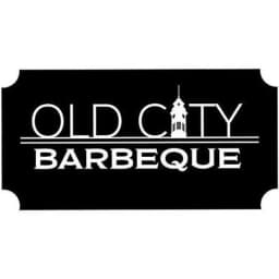 Old City Barbeque logo on a black background with a clock tower illustration.